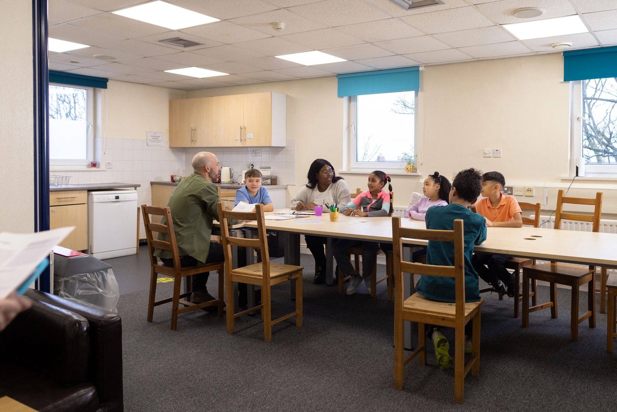 Behavioral health counseling session with supportive group discussion